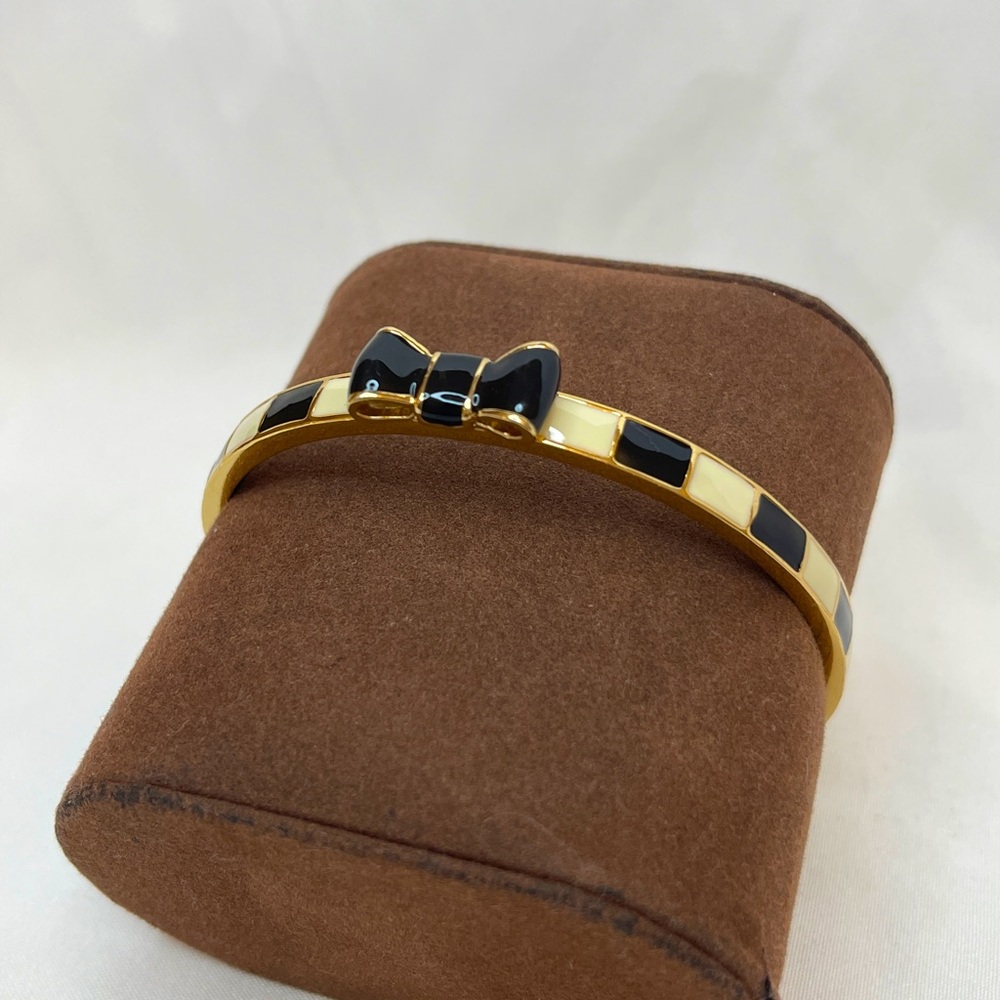 Kate Spade Creme, black and gold Bangle